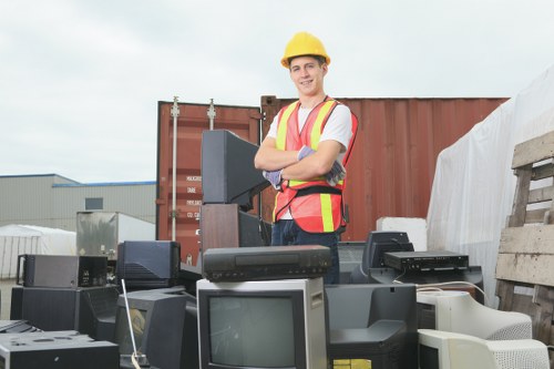 Workers wearing PPE and high-visibility vests during clearance